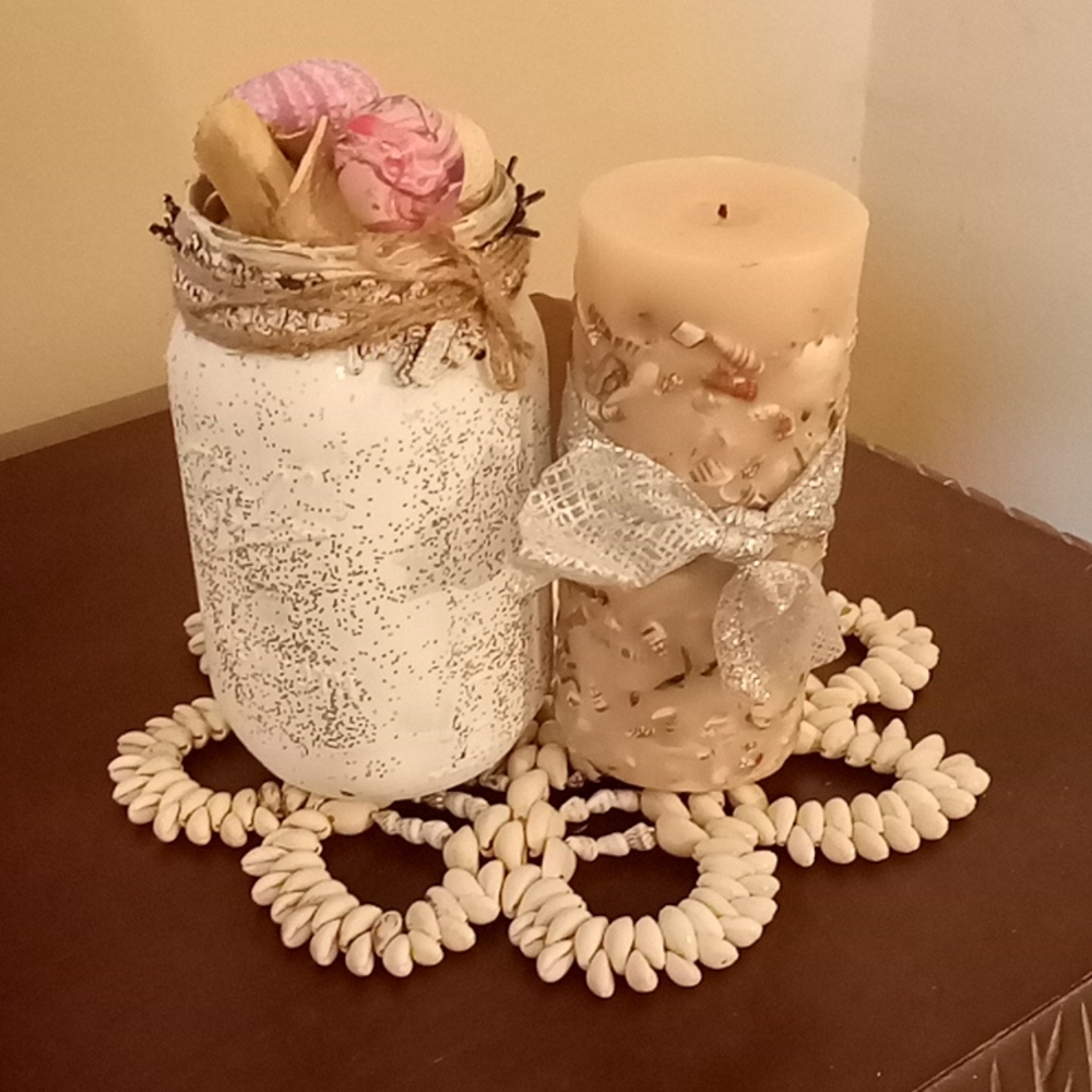 candle/potholder/mason jar of shells